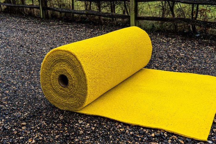 Yellow spaghetti site mat PVC roll laid flat showing anti-slip surface