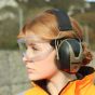 Safety goggles worn alongside ear defenders showing hearing and eye protection compatibility on site | CMT Group UK