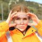 Panoramic safety goggles worn by site operative outdoors showing full facial fit and field of vision | CMT Group UK