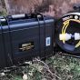 UtilityLite 1280Wh portable power pack in waterproof hardcase alongside UtilityLite 25m LED reel on outdoor site | CMT Group UK