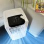 Portable air conditioner digital control panel showing mode fan timer swing and power buttons with remote control | CMT Group UK