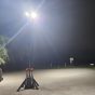 CMT Power portable lighting tower 5m fully deployed with LED heads at height on construction site at night | CMT Group UK