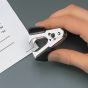 Claw staple remover in use removing staple from document hand demonstrating grip technique | CMT Group UK