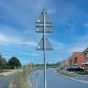 76mm galvanised steel sign post mounted in base plate showing clamp fixing detail | CMT Group UK