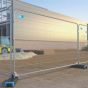 Securasite temporary site fence panels installed in run showing coupler connections and ballasted feet on construction site | CMT Group UK