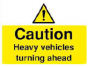 Caution - Heavy Vehicles Turning Ahead Sign - PVC
